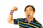 Thai Man Blow A Whistle And Fist Stock Photo