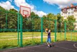 Young Man Training In Basketball Stock Photo