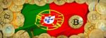 Bitcoins Gold Around Portugal  Flag And Pickaxe On The Left.3d I Stock Photo