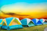 Tourist Tent With Beautiful Sunset Background Stock Photo