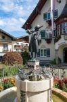 Statue Of Mozart Outside The Town Hall Building In St. Gilgen Stock Photo
