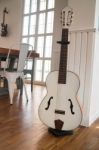 Acoustic Guitar In The Room Stock Photo