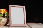 Old Photo Frame On Wooden Stock Photo