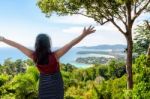 Woman Tourist Happy Gestures On High Scenic View Stock Photo