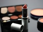 Lipstick With Other Cosmetics Stock Photo