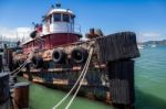 Old Tugboat Moored At The Jetty In Sausalito Stock Photo