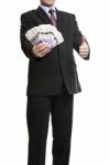 Some Unrecognizable Businessman In Suit Showing A Spread Of Poun Stock Photo