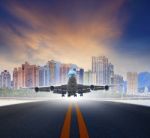 Air Plane Landing In Town Airport Stock Photo