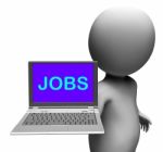 Jobs On Laptop Shows Unemployment Employment Or Hiring Online Stock Photo