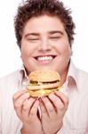 Smiled Chubby And Hamburger Stock Photo