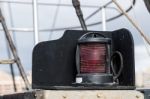 Red Lamp On An Old Yacht Moored In Los Christianos Harbour Tener Stock Photo