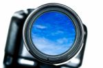 Camera Lens With Blue Sky Stock Photo