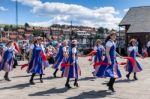 Women Morris Dancing In Whitby North Yorkshire Stock Photo