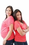 Beautiful Hispanic Pregnant Woman With Her Daughter Stock Photo
