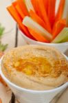 Fresh Hummus Dip With Raw Carrot And Celery Stock Photo