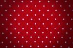 Red Knit With Polka Dot Background Stock Photo