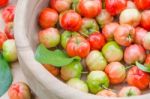 Acerola Cherry In Wood Bowl Stock Photo