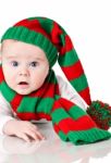 Baby With Christmas Hat And Scarf Stock Photo