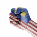 Malaysian Flag On Hand Stock Photo