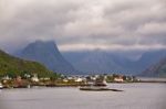 Norway Village On A Fjord. Nordic Cloudy Summer Day Stock Photo