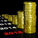 Coins On 2015 Shows Monetary Expectations Stock Photo