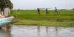 Faversham, Kent/uk - March 29 : Cyclists Pause To Look At The Ri Stock Photo