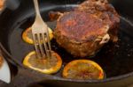 Pork Chop Seared On Iron Skillet Stock Photo