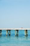 Wooden Jetty Bridge On A Beautiful Maldivian Beach Stock Photo