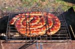 Beef Sausages Grilled On A Coals. Kielbasa Barbecue Stock Photo