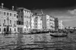 Gondoliers Ferrying People In Venice Stock Photo