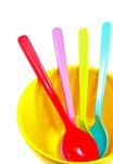 Plastic Spoons In Bowl Stock Photo