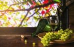 Wine Grapes On A Wooden Table Stock Photo