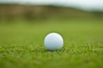 Golf Ball On The Grass Stock Photo