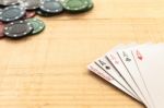 Cards And Poker Chips On Wooden Background Stock Photo