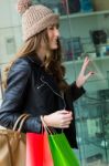 Young Woman Goes Shopping In The City Stock Photo