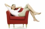 Woman Red Chair Stock Photo
