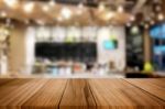 Selected Focus Empty Brown Wooden Table And Coffee Shop Or Resta Stock Photo