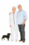 Couple With Their Pet Dog Stock Photo