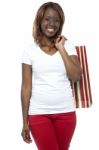 African Girl Holding Shopping Bag Stock Photo