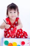 Asian Girl Painting Her Hand Using Drawing Instruments, Creativity And Education Stock Photo