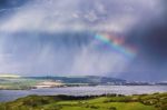 Rainbow After Rain. Spring Rain And Storm In Mountains Stock Photo
