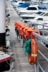 Row Of Lifejackets In Los Gigantes Marina Stock Photo