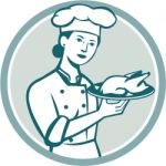 Female Chef Serving Chicken Roast Circle Retro Stock Photo