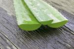 Aloe Vera Leaves On Wooden Stock Photo