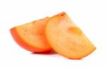 Slice Of Persimmon Isolated On The White Background Stock Photo