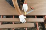 Worker Installing  Wood Floor Stock Photo
