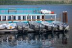 Boats On A Jetty In Lake Mcdonald Near Apgar Stock Photo