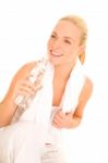 Woman Holding Bottle With Towel Stock Photo