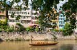Traditional Punt In Front Of The Waterfront Of Tubingen Aka Tuebingen, Germany Stock Photo