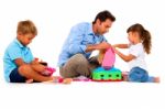Father Playing With Children Stock Photo